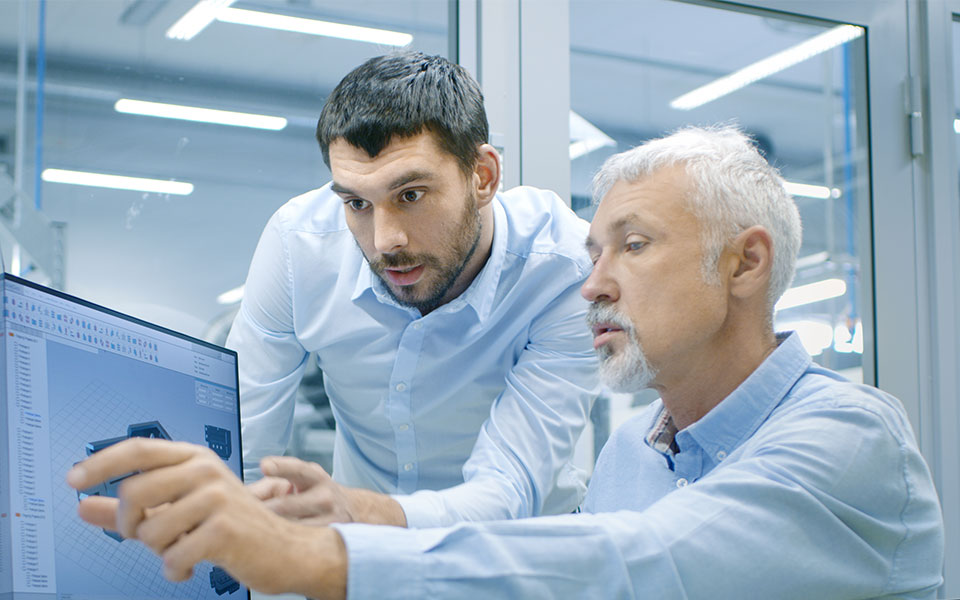 two engineers discussing about LED outdoor lighting technology research